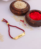 Elegant Marron Thread Rakhi with name.