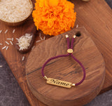 Elegant Marron Thread Rakhi with name.